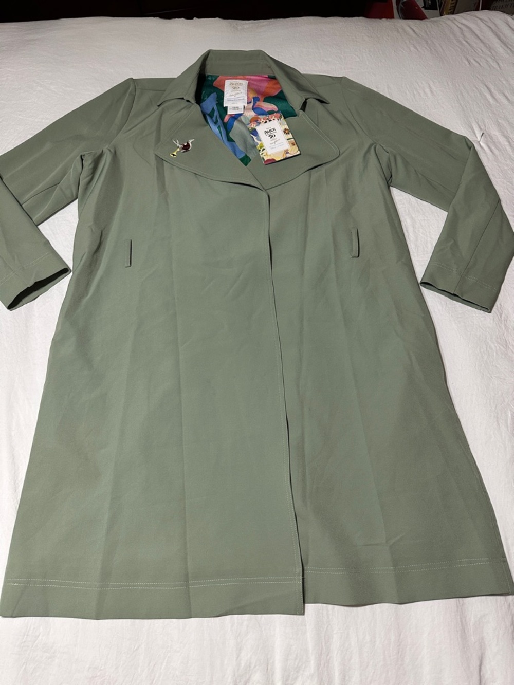 Disney Alice 70th Anniversary Jacket in Sage Green with Multicolor Lining.